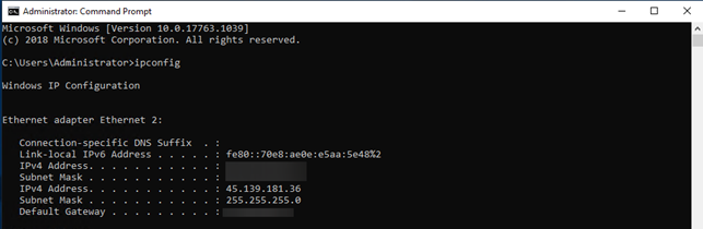 Windows Command Prompt showing the entered IP config command.